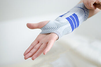 Person wearing a wrist support